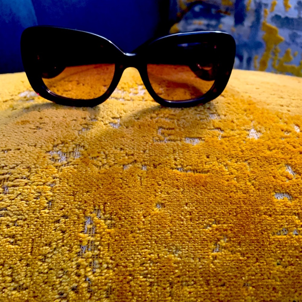 Prada Sunglasses.